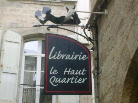 Utazás lakóautóval Béziers - Pezenas könyvesbolt cégér